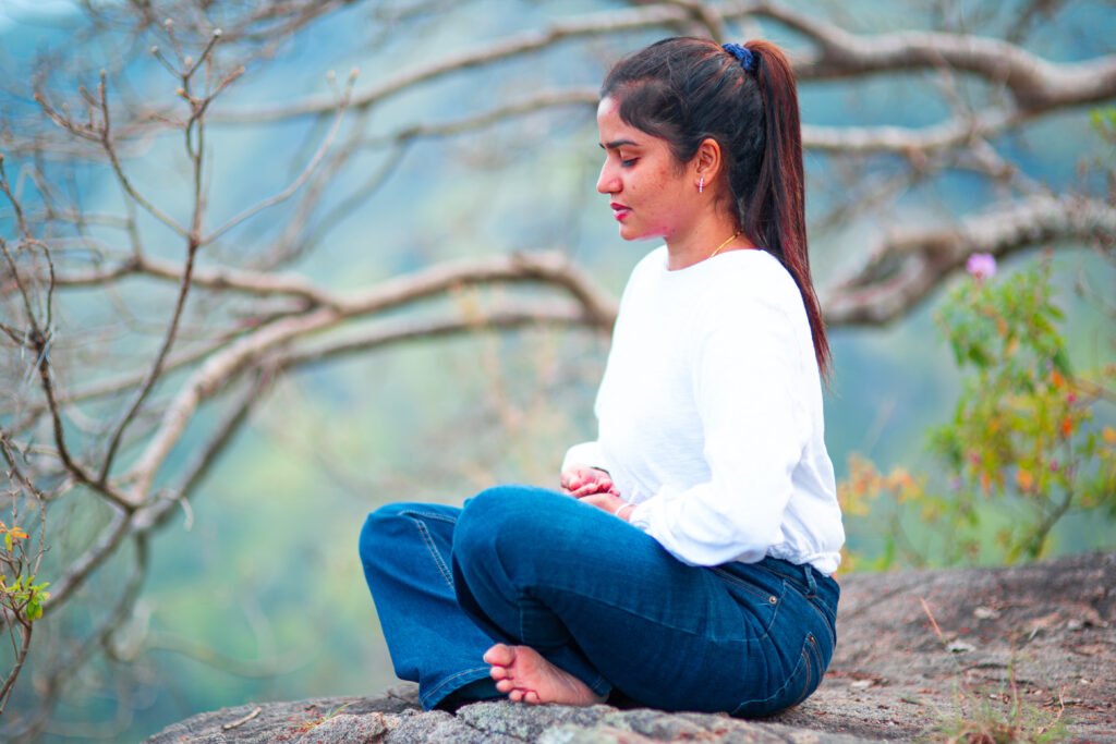 The Girl is meditating at the The Premises of IBandarawela Asapuwa